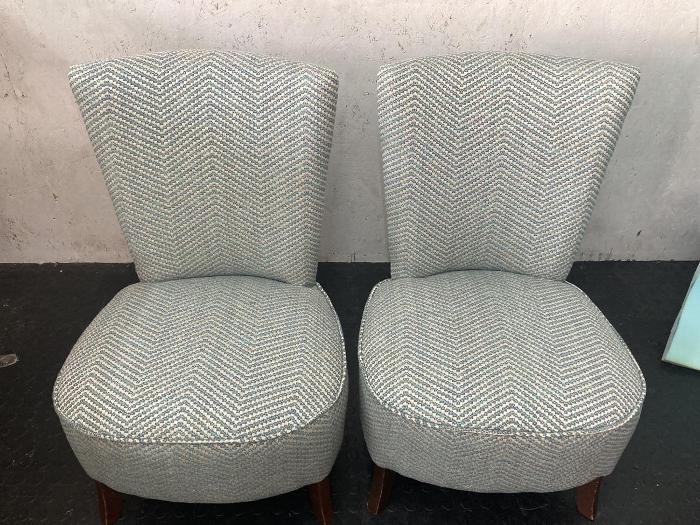 Chairs upholstered with grey fabric